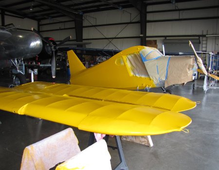 The finished Stinson 10 parked in the hangar