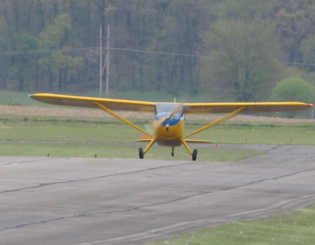 The Stinson 10 taxiing to the runway for its first flight